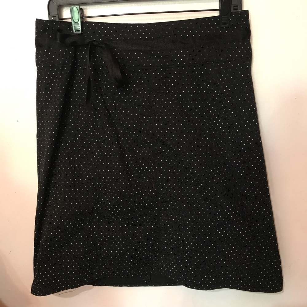 Black skirt with white polka dots